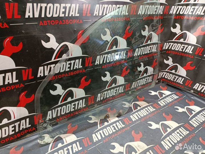 Стекло двери переднее левое Renault Logan седан