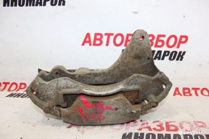 Суппорт тормозной передний левый Chevrolet Niva