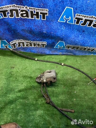 Суппорт тормозной задний левый Mazda 3 BL Z6 2011