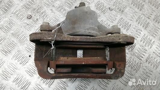 Суппорт тормозной передний левый KIA sportage 3 (2BL19K701)