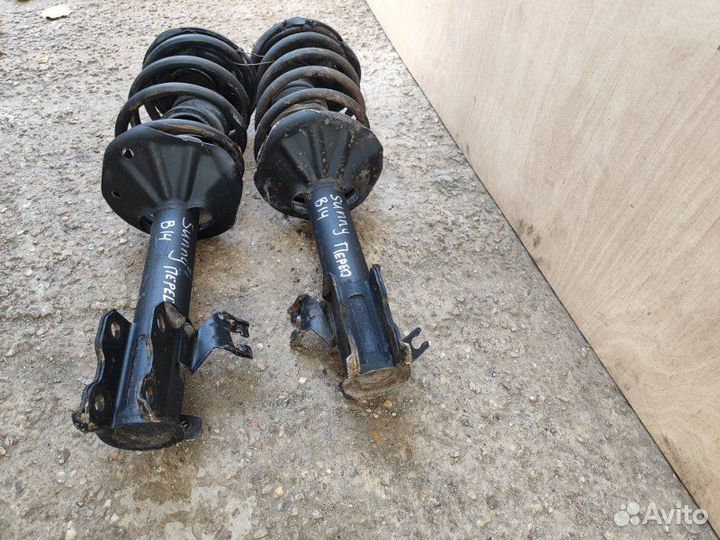 Стойка подвески передняя Nissan Sunny FB14 GA16