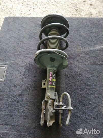 Стойка амортизатора передняя правая Mitsubishi