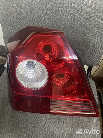 Фонарь левый Geely MK 08-15г