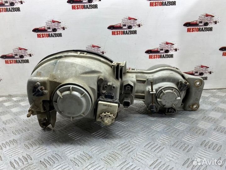 Фара галогеновая передняя левая Kia Shuma лифтбек