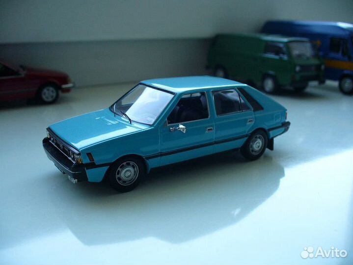 IST и IXO: модели автомобилей (масштаб 1:43)