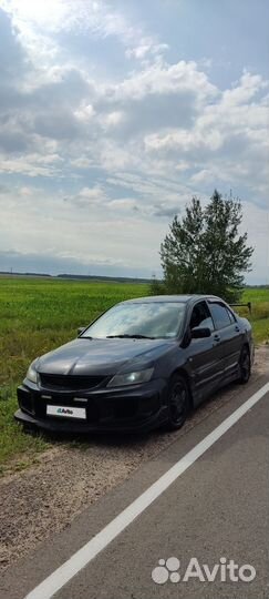 Mitsubishi Lancer 1.6 МТ, 2006, 274 000 км