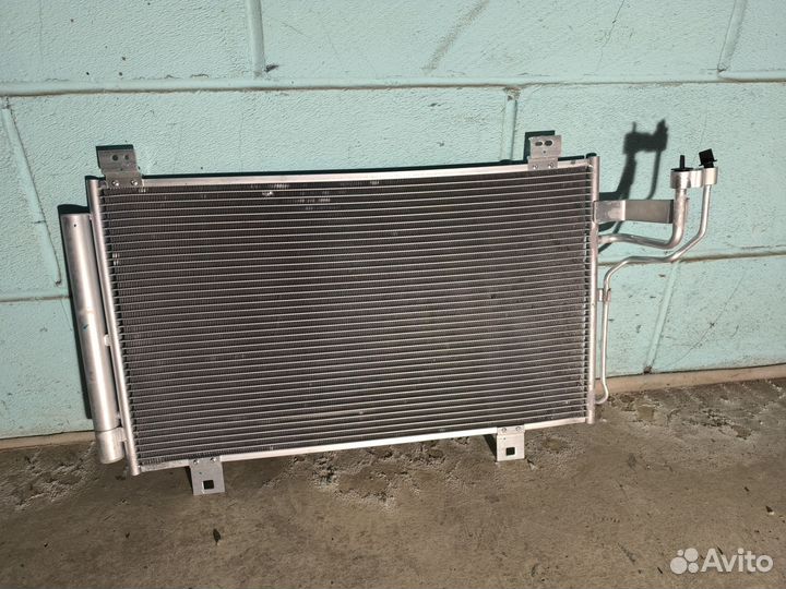 Радиатор кондиционера mazda