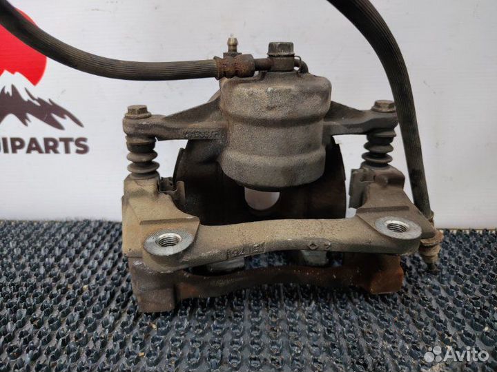 Суппорт тормозной передний левый Toyota Avensis