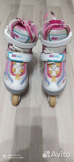 Роликовые коньки