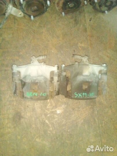 Суппорт тормозной Toyota Ipsum.Gaia Picnic SXM10