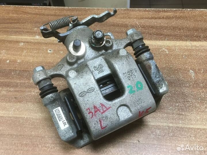 Суппорт задний левый Kia K5