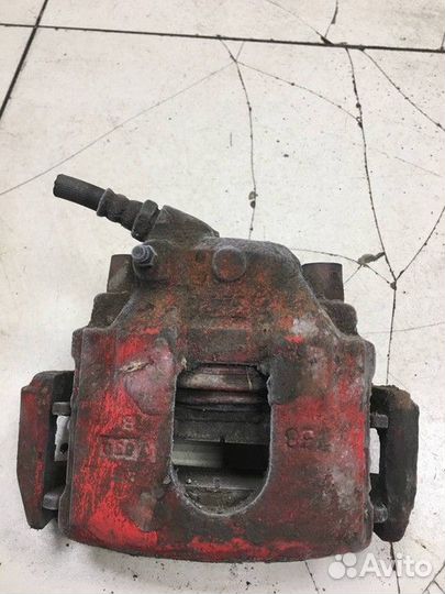 Суппорт тормозной передний левый Kia Shuma