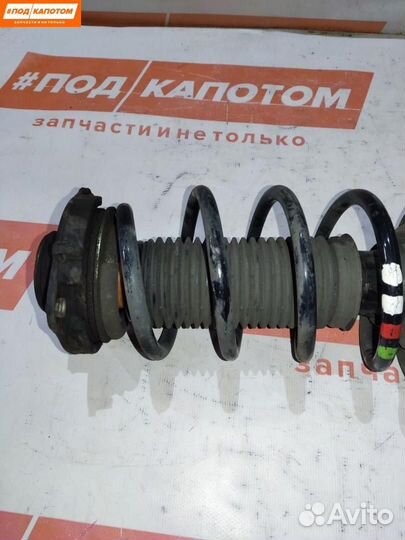 Стойка амортизатора передняя левая Volkswagen