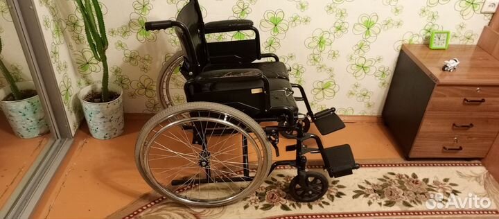 Инвалидное кресло