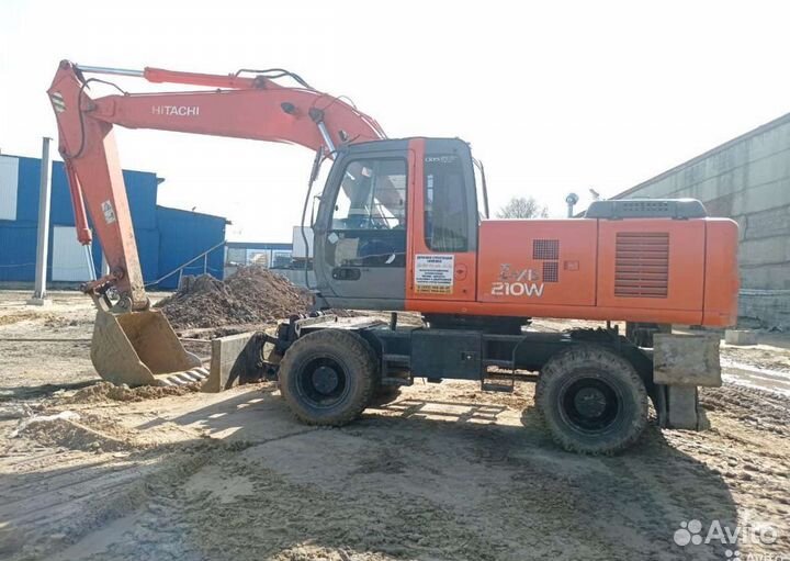 Услуги колёсного экскаватора в Байкальске