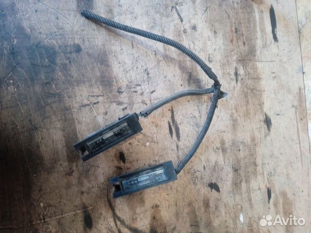 Фонарь подсветки заднего номера Opel Corsa D