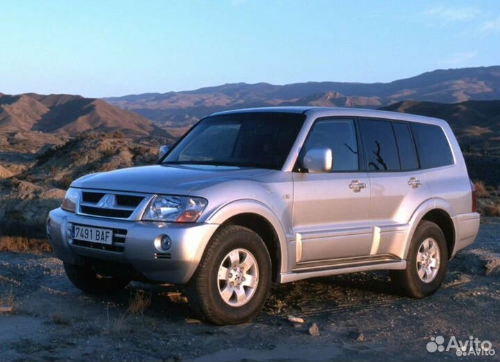 Стекло фары Mitsubishi Pajero III 1999 - 2006