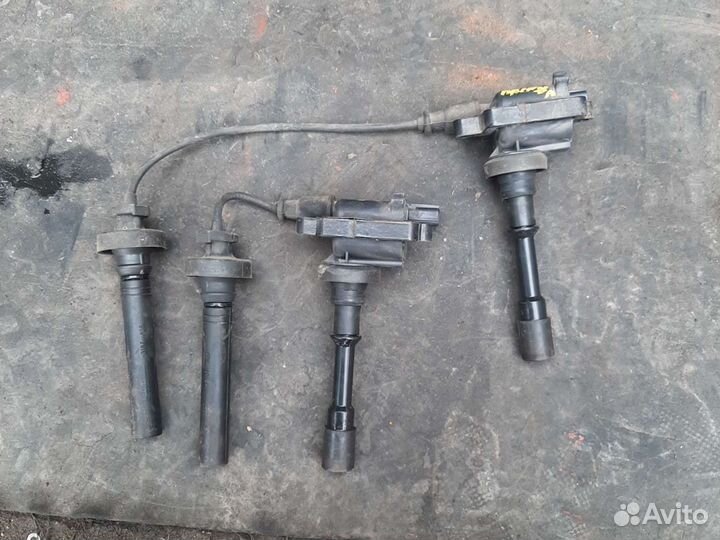 Катушка зажигания Мицубиси Лансер 1,6i