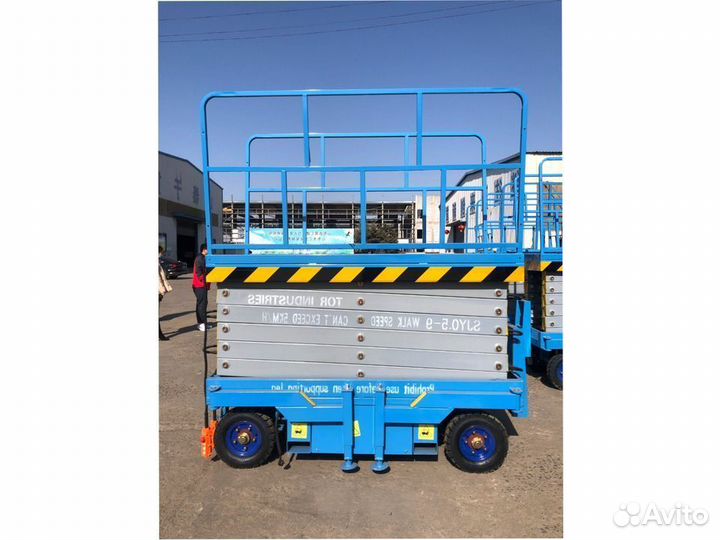 Ножничный подъемник