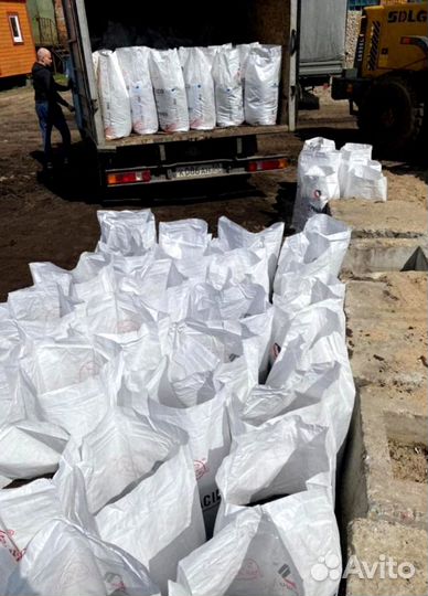 Доставка чернозема в мешках