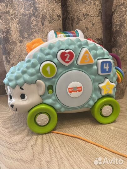 Игрушки fisher price. Ежик, лось, ленивец