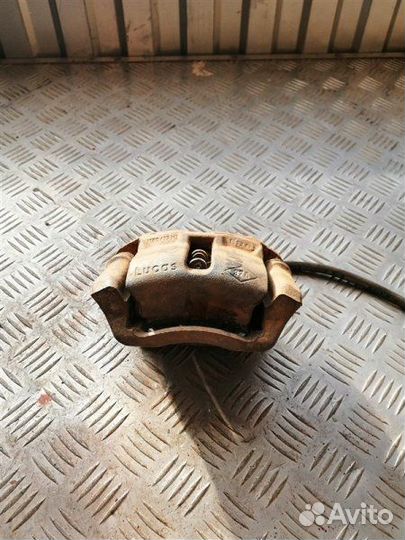 Суппорт тормозной передний правый Renault Logan