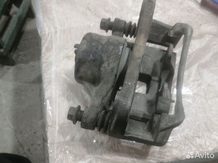 Суппорт мицубиси галант