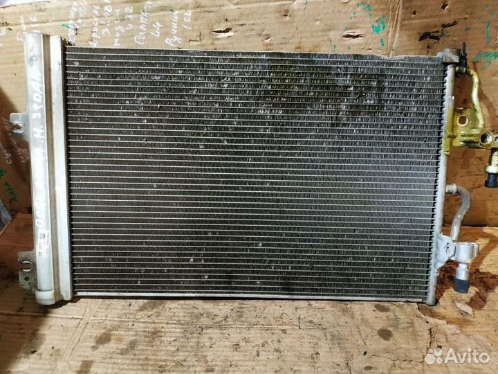 Радиатор кондиционера Opel Astra