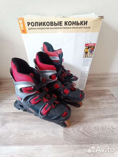 Роликовые коньки