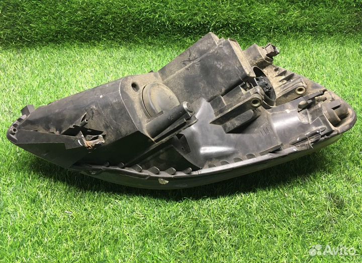 Фара левая Opel Zafira B