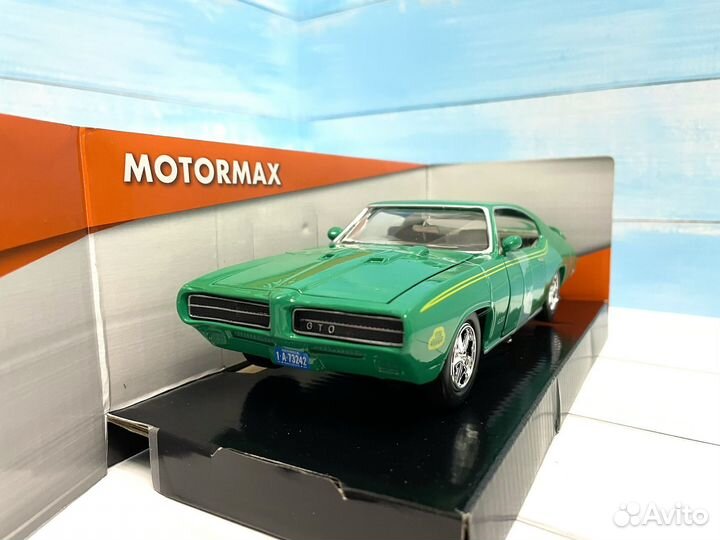 Модель автомобиля Pontiac GTO 1:24 металл