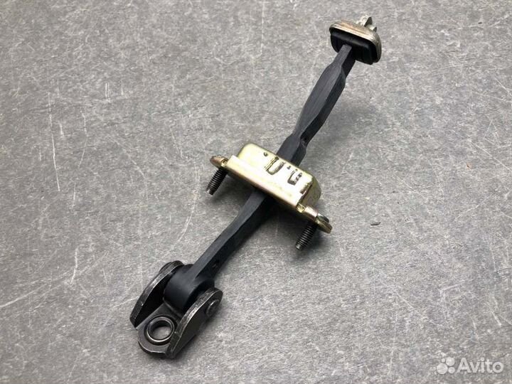 Ограничитель двери передний правый Ford Focus DNW