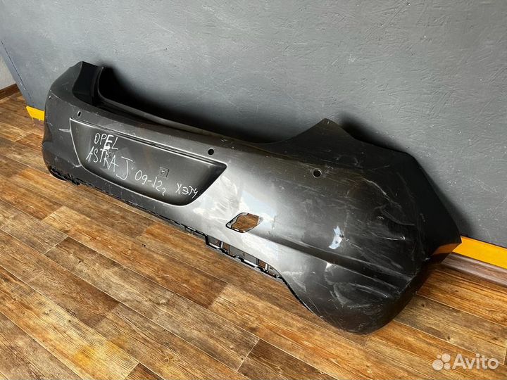 Задний бампер Opel Astra J