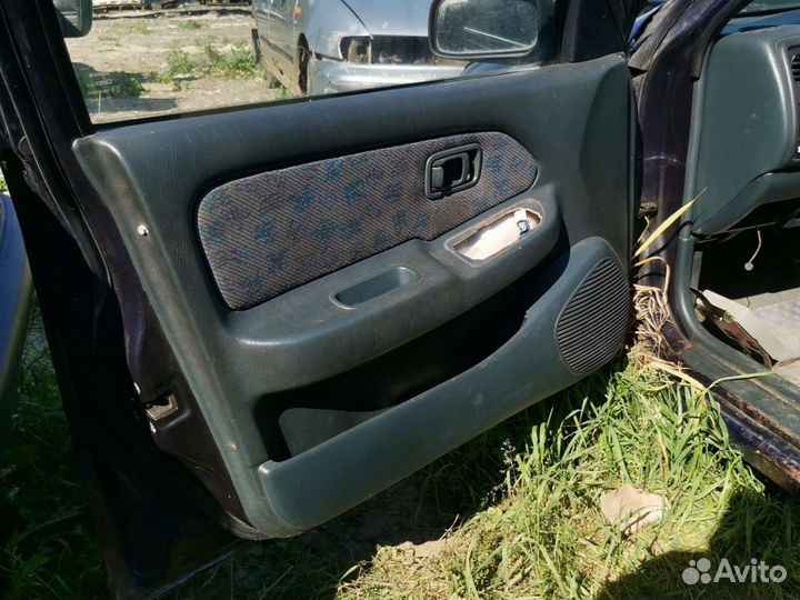 Обшивка двери ниссан альмера н15