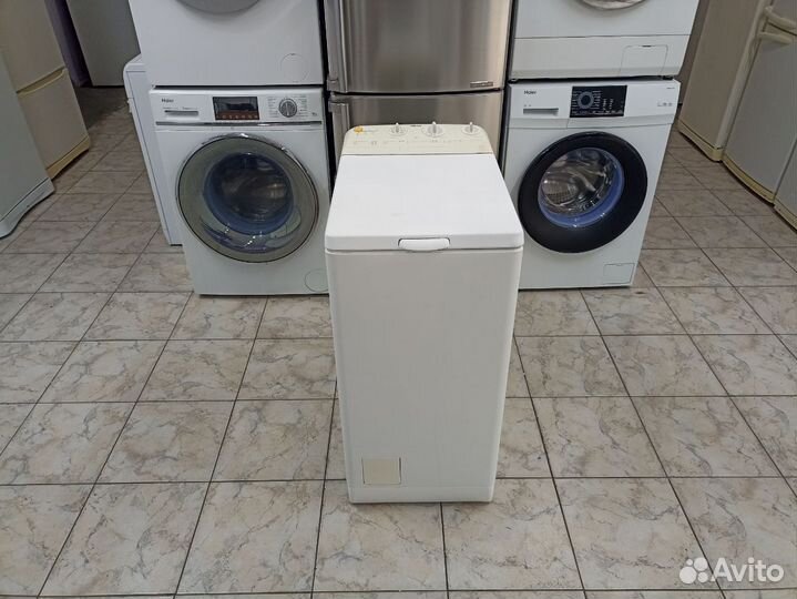 Стиральная машина Zanussi с вертикальной загрузкой