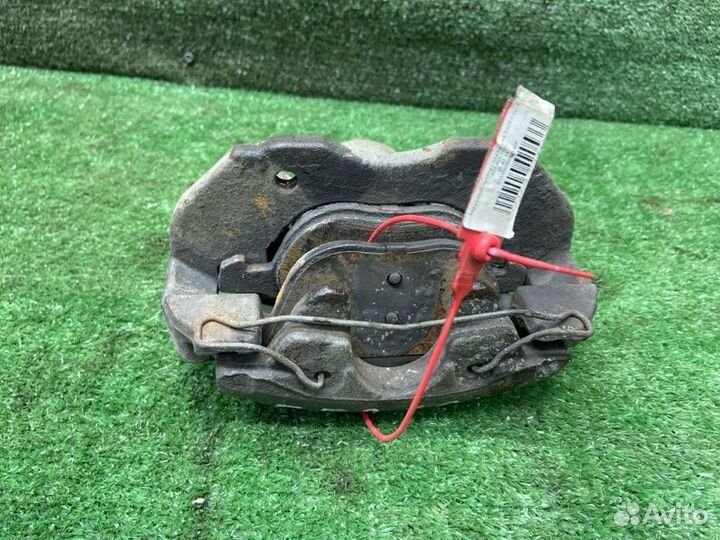 Тормозной суппорт передний левый Ford Focus 2