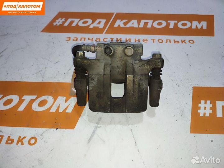 Суппорт тормозной задний левый Mitsubishi Lancer