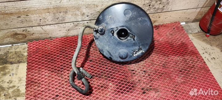 Вакуумник тормозной Mitsubishi Lancer