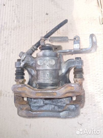 Суппорт задний левый Mazda 3 BM