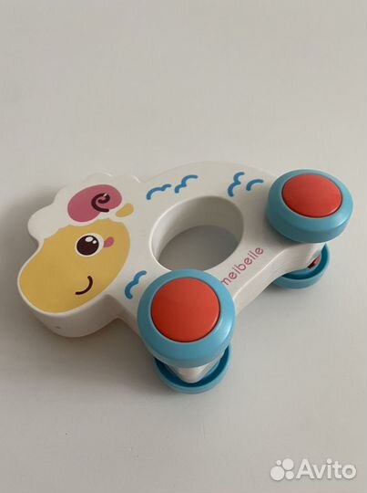 Игрушка каталка