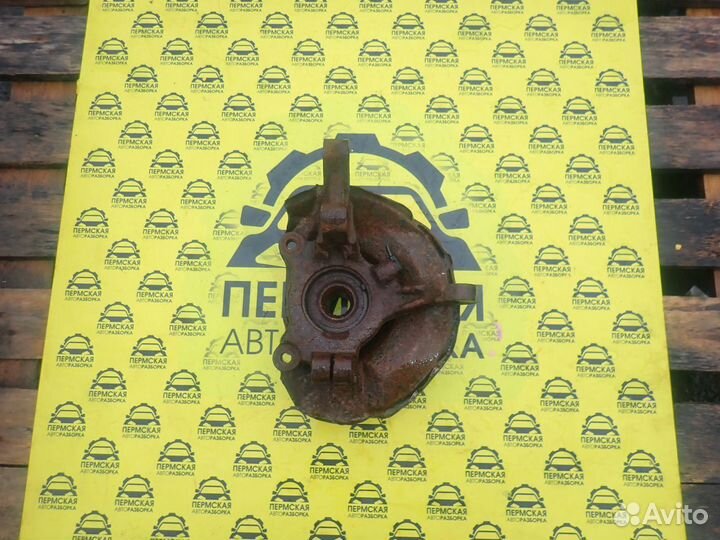 Кулак передний правый Mitsubishi Lancer 10 X