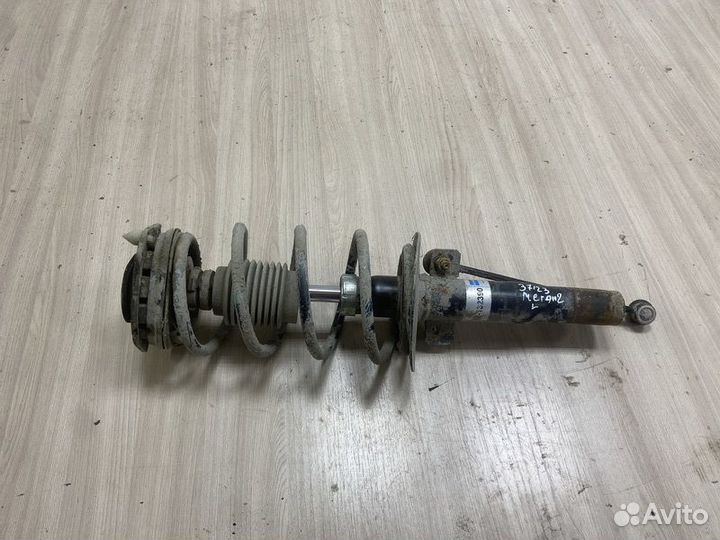 Амортизатор передний левый Renault Megane 2 с2002