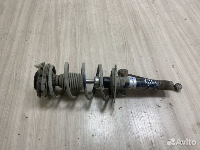 Амортизатор передний левый Renault Megane 2 с2002