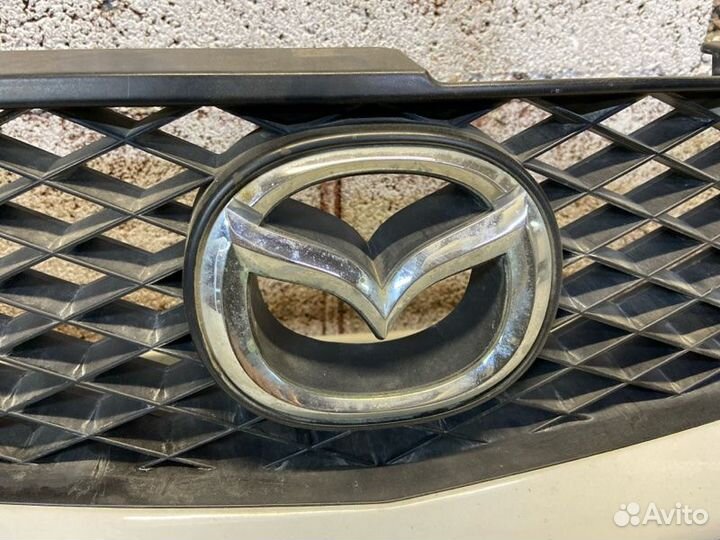 Решетка радиатора Mazda Demio DW3W 1996-2002