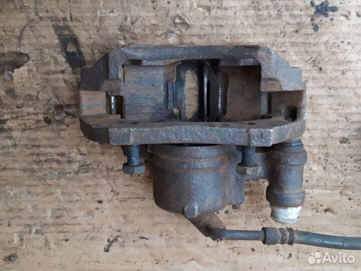 Суппорт передний левый Форд Эскорт 90-95г.в