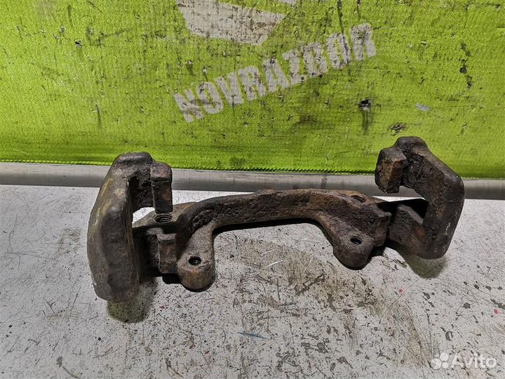 Скоба суппорта переднего бмв Е36