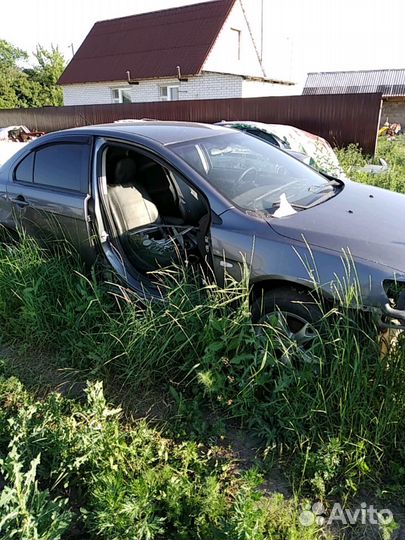 Бензобак Mitsubishi Lancer 10