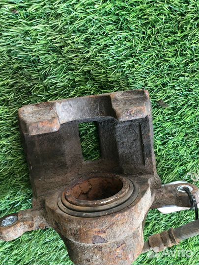 Суппорт левый Kia Rio 2