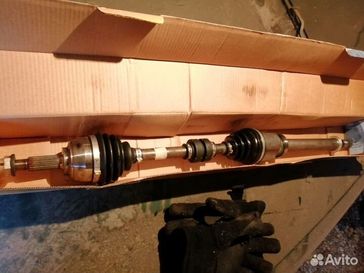 Привод в сборе Nissan Note 1.5D с подвесным подшип