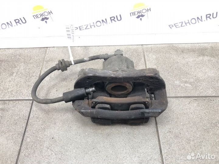 Суппорт тормозной передний левый Chevrolet Cruze